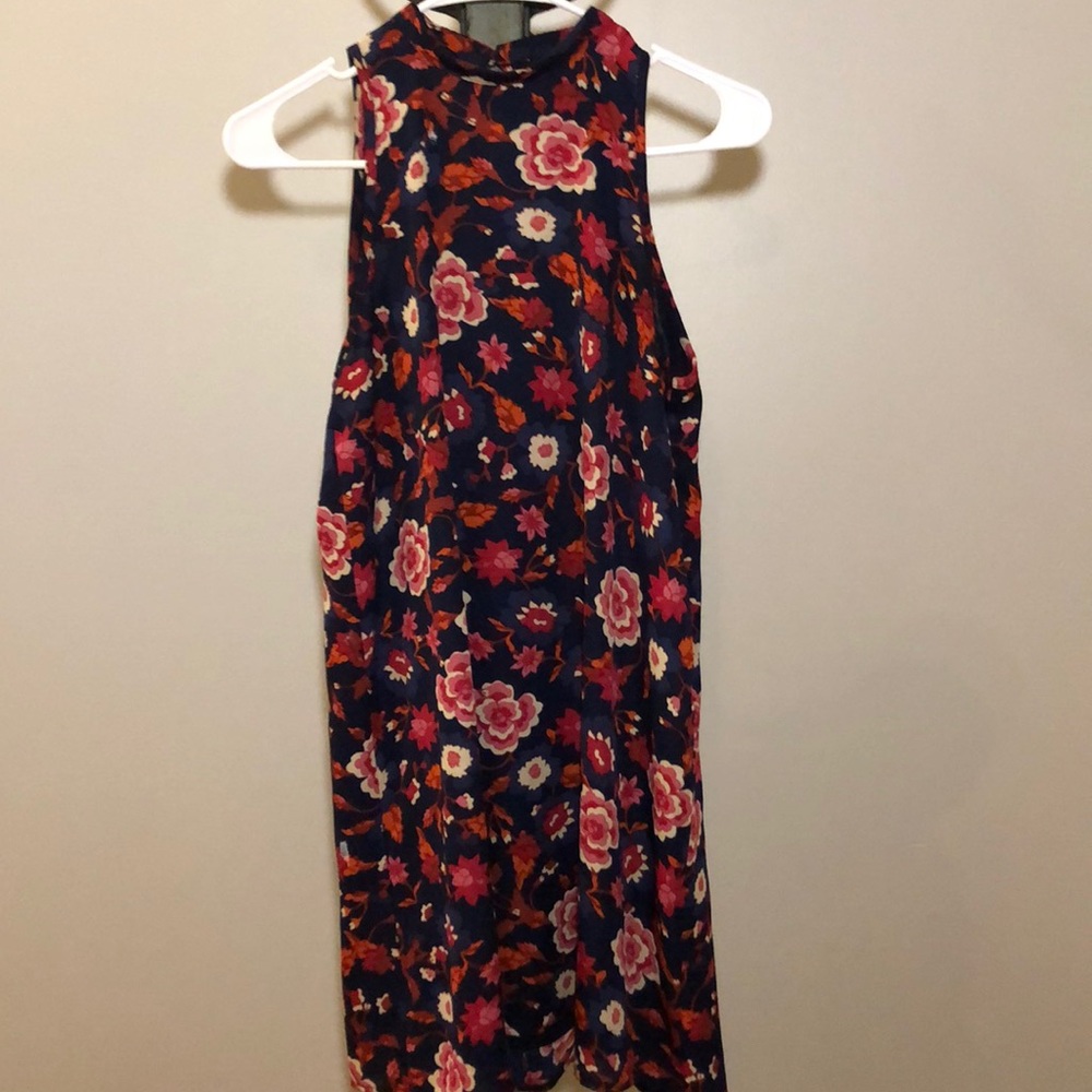 Blue halter dress with a floral pattern